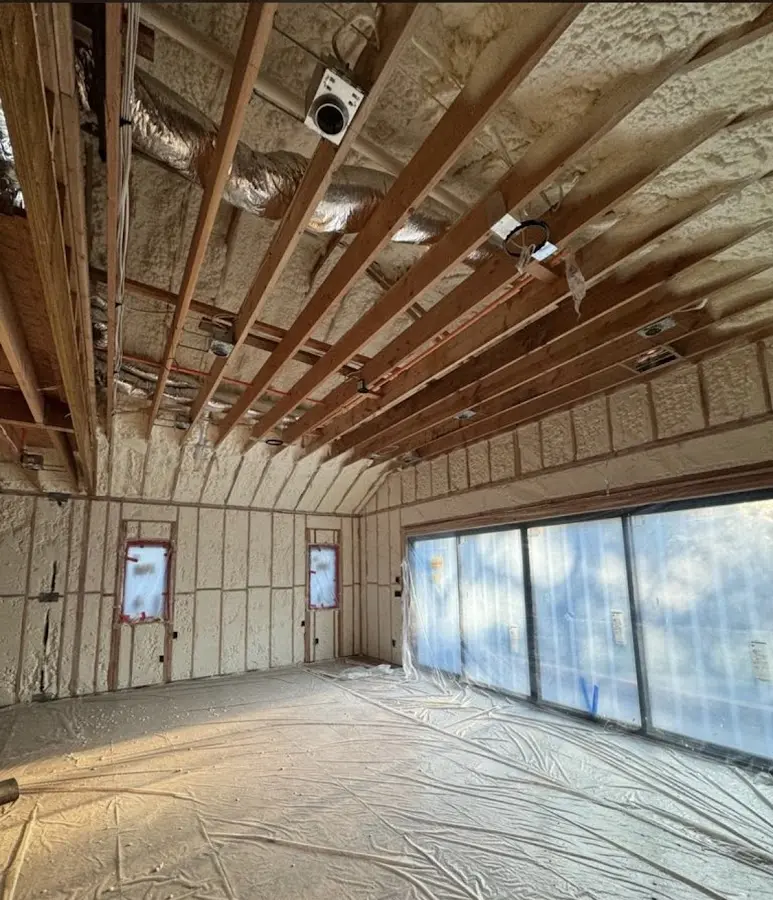 Interior walls and ceiling insulated with spray foam during new construction in Catoosa